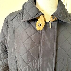 Fabulous spring/fall jacket, fun leopard lining, waist snaps for shaping. Sz. L